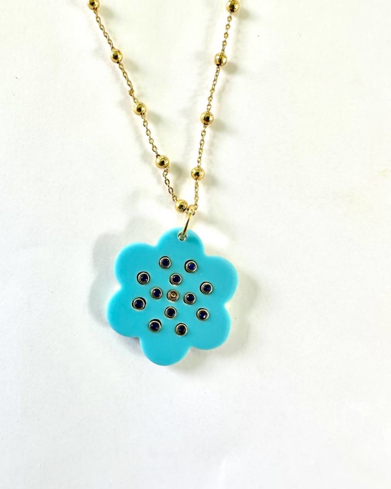 Front of a size O/S Camellia Pendant in Turquoise in Turquoise by ASHA. | dia_product_style_image_id:330302